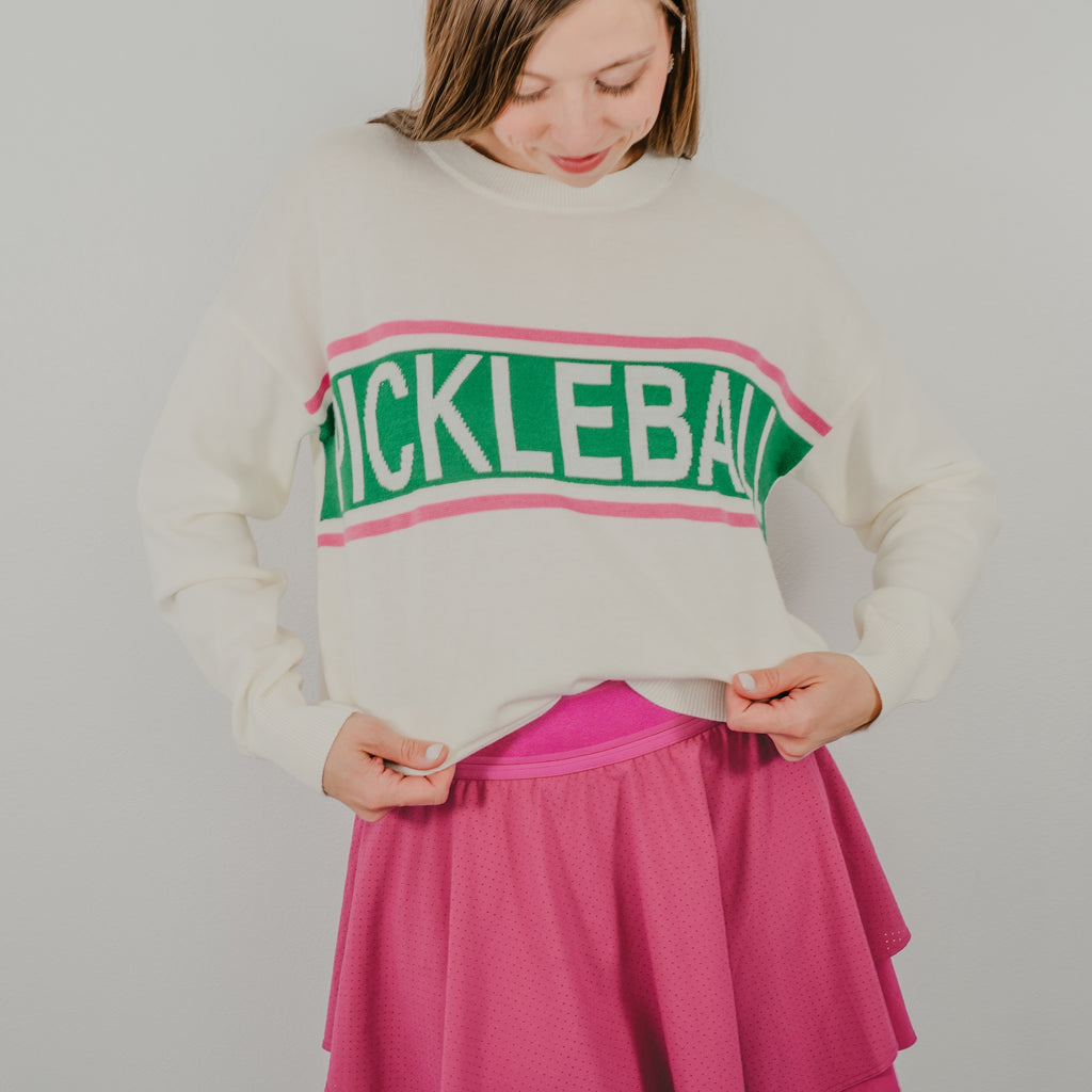 Oversized cream-colored crewneck sweater featuring a vintage-style 'Pickleball Club' graphic on the front.