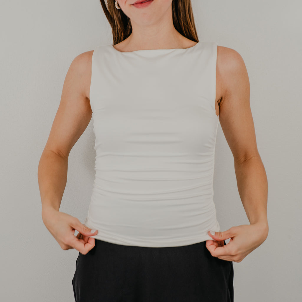 Front view of the Second Skin Tank in a true white, featuring a high scoop neckline and a seamless, form-fitting silhouette.